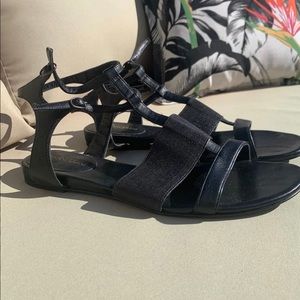 Black gladiator flat sandals by Enzo Angolini